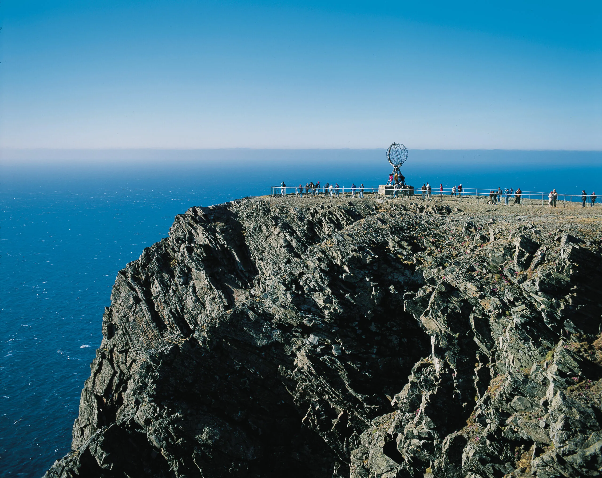 A dramatic cliff at North Cape, Norway, the northernmost point of Europe, overlooking the Arctic Ocean with stunning views.